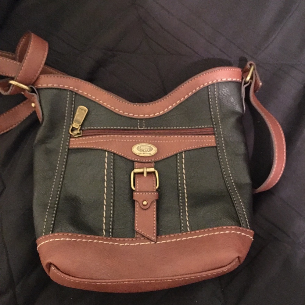 Black and brown purse with charging bank inside